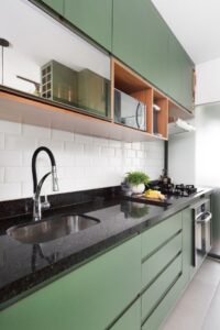 pista green kitchen interior with black counter top