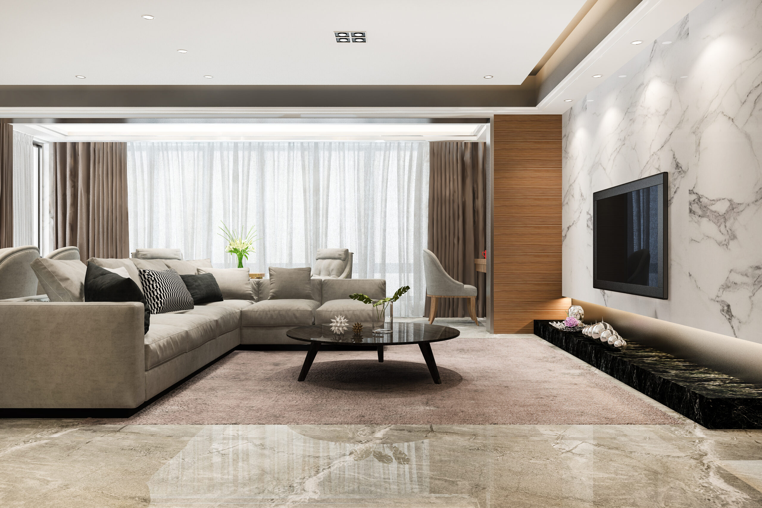 Modern living room interior design in Ahmedabad with marble TV wall, false ceiling lighting, and minimalist sofa layout